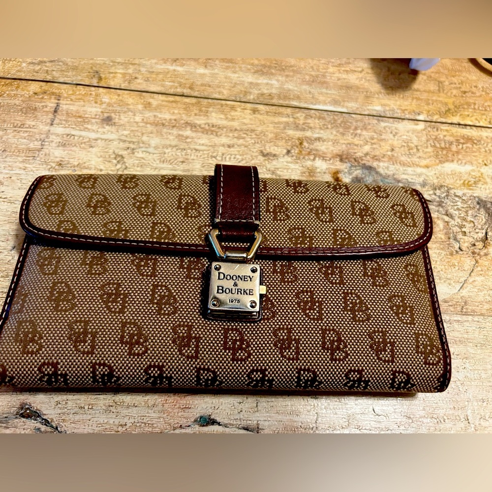Vintage Dooney & Bourke wallet with Check book insert.